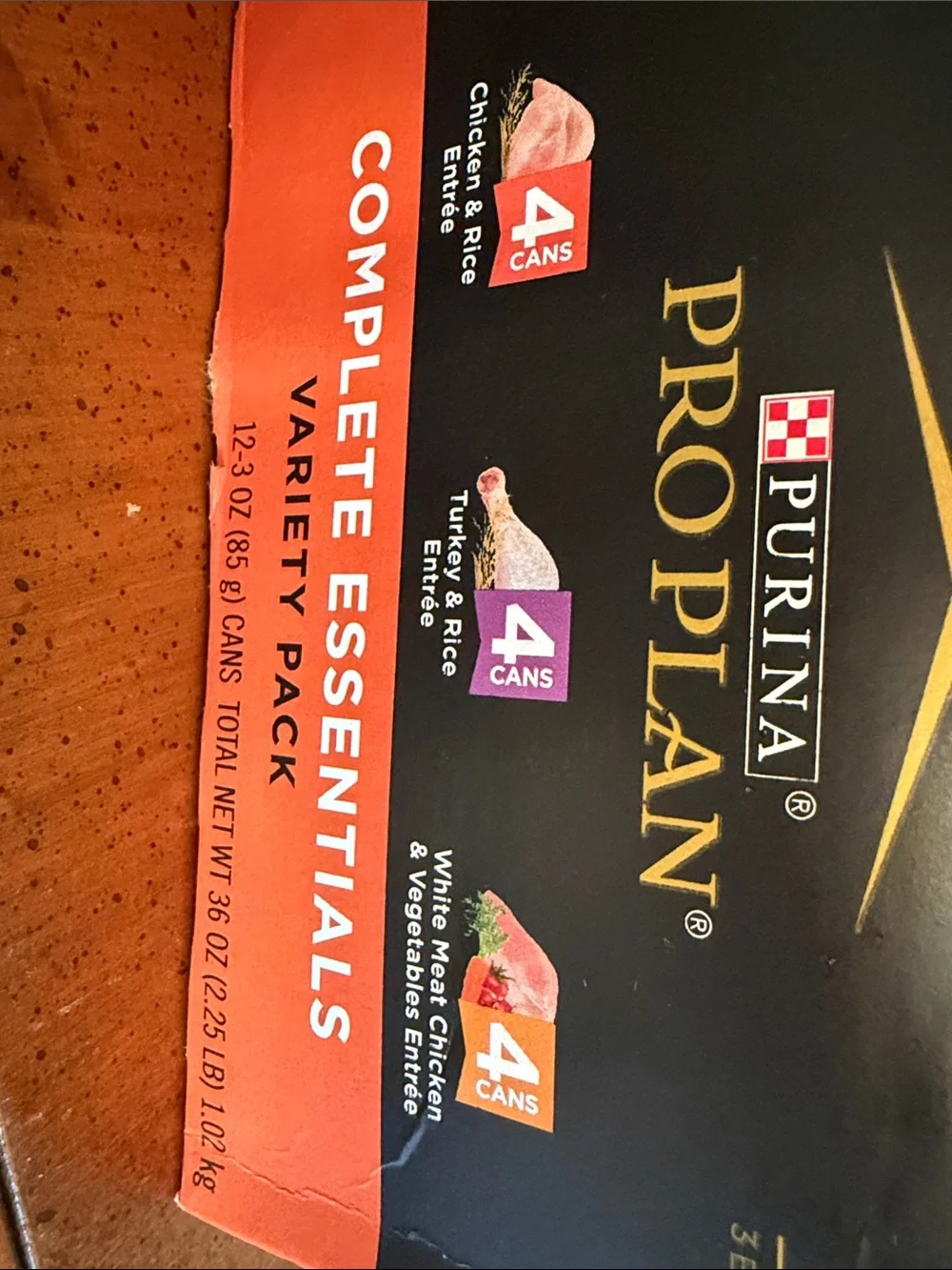 New Complete Essentials Cat Food Variety Pack - Orange & Black